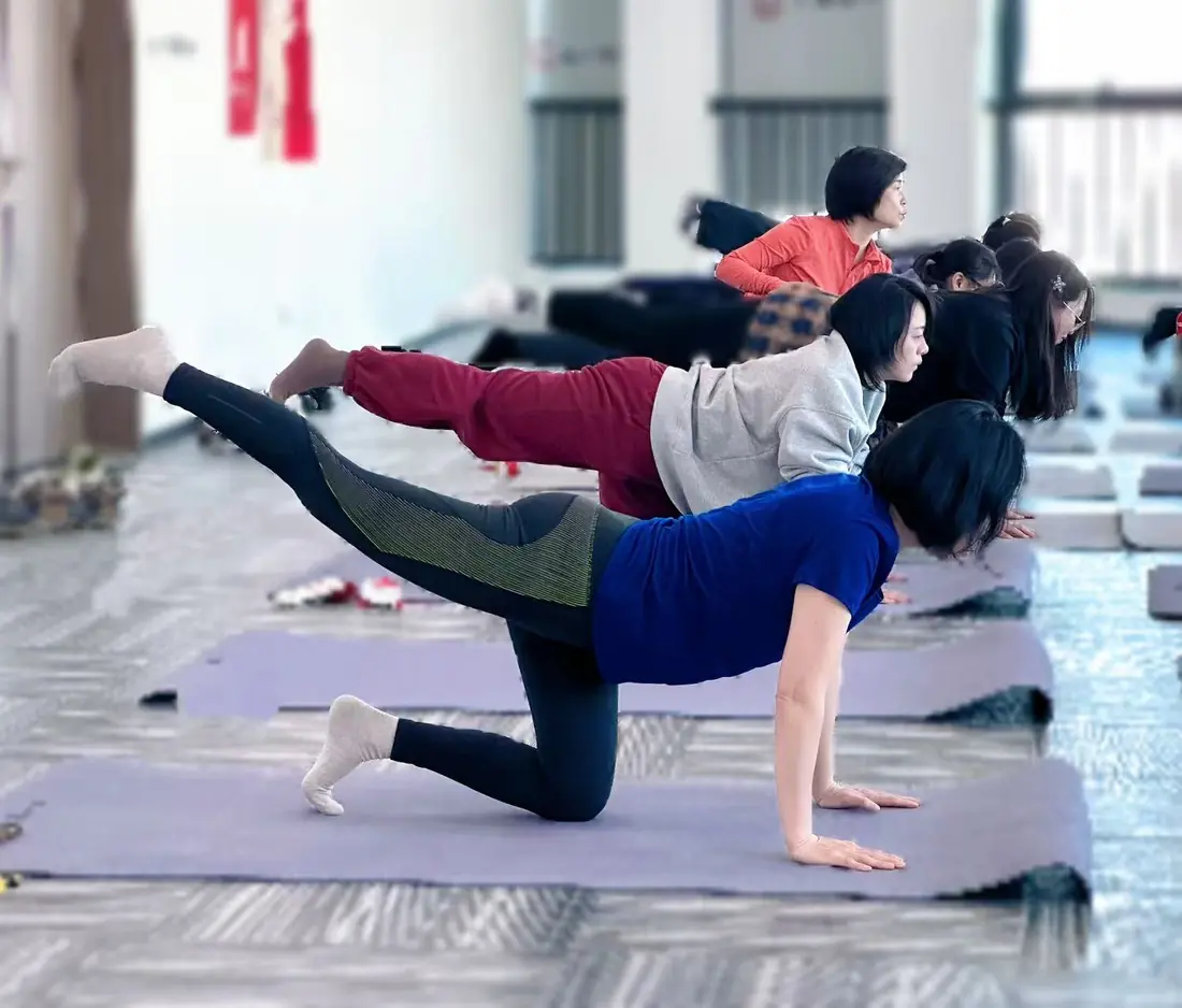 Practicing yoga poses